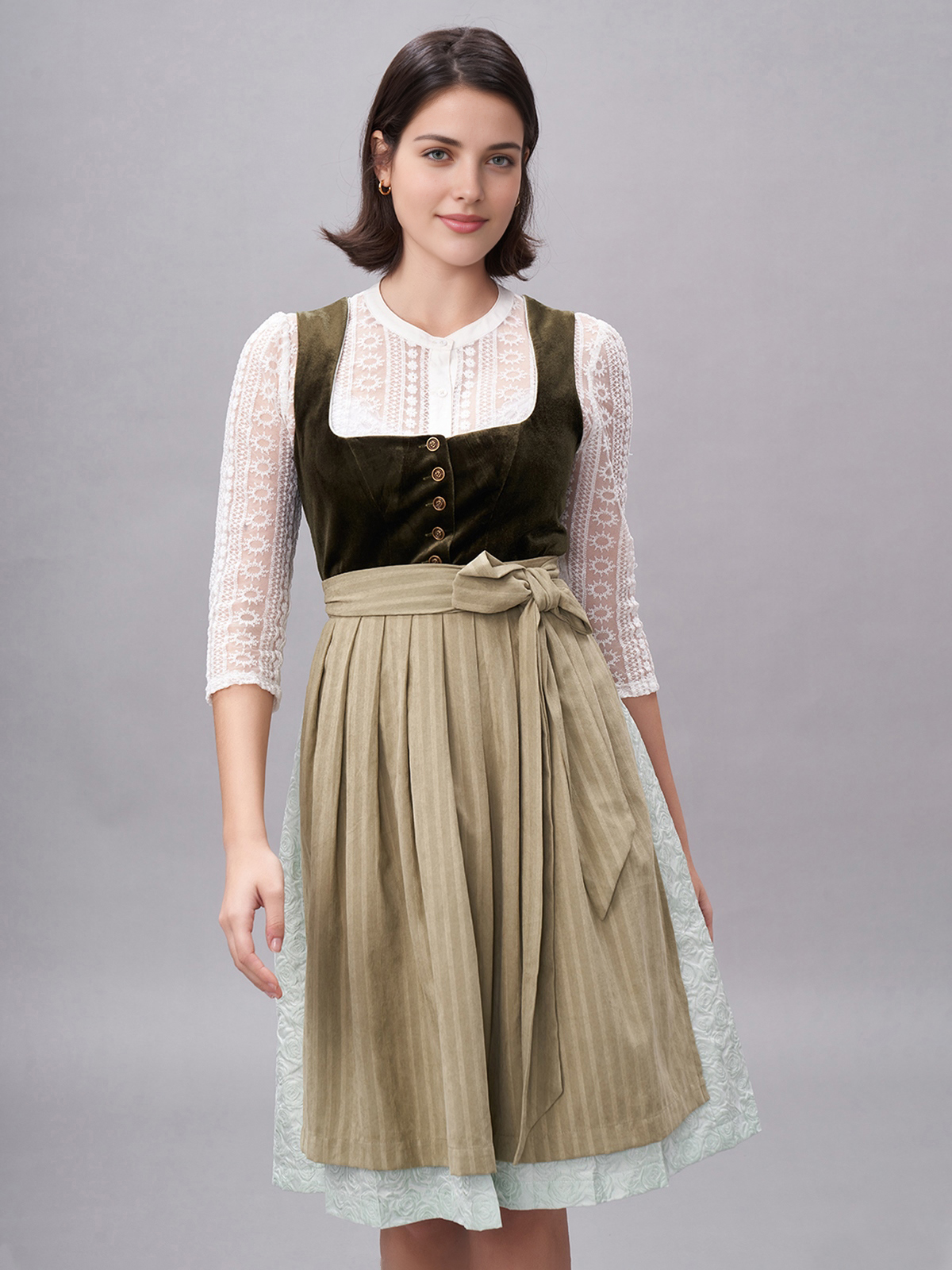 Ein elegantes grünes Dirndl mit floralen Details