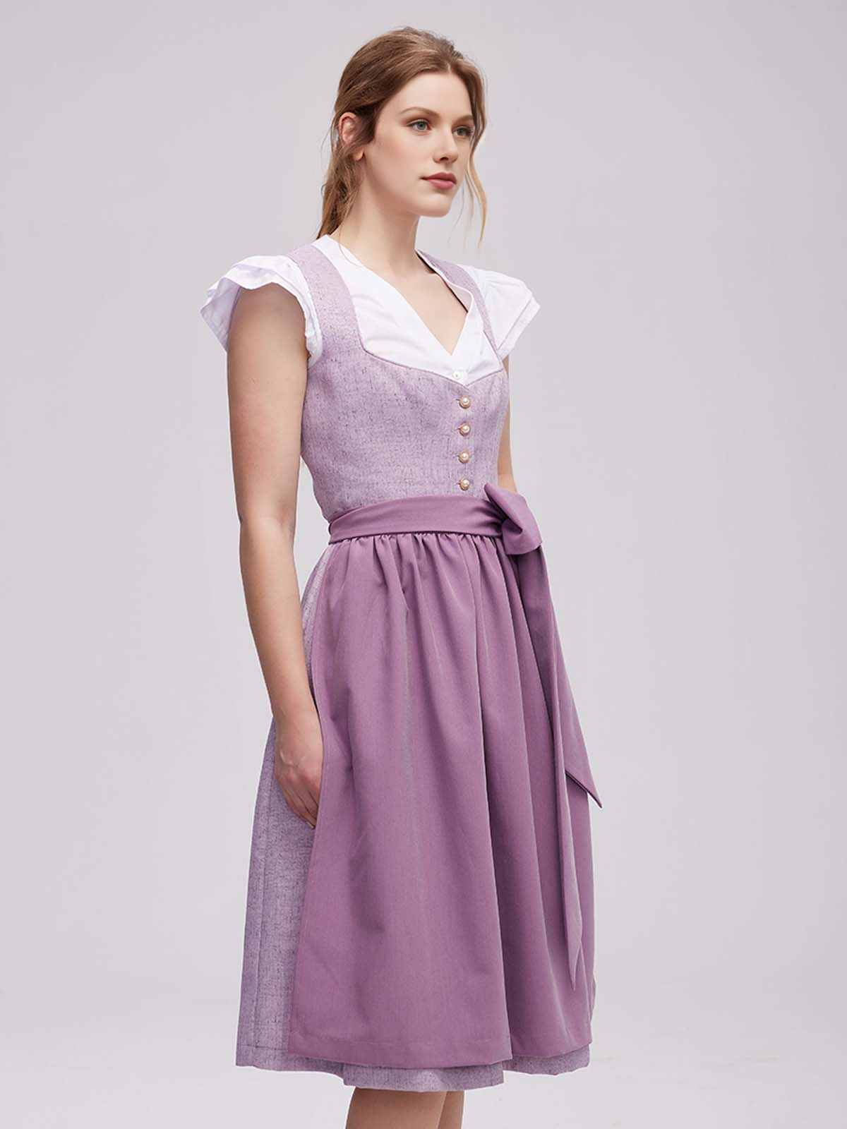 Modernes pinkes Samt Dirndl mit femininem Schnitt